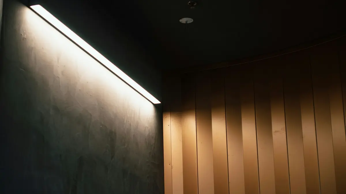An LED strip light illuminates a corner with dark walls and warm wooden textures.