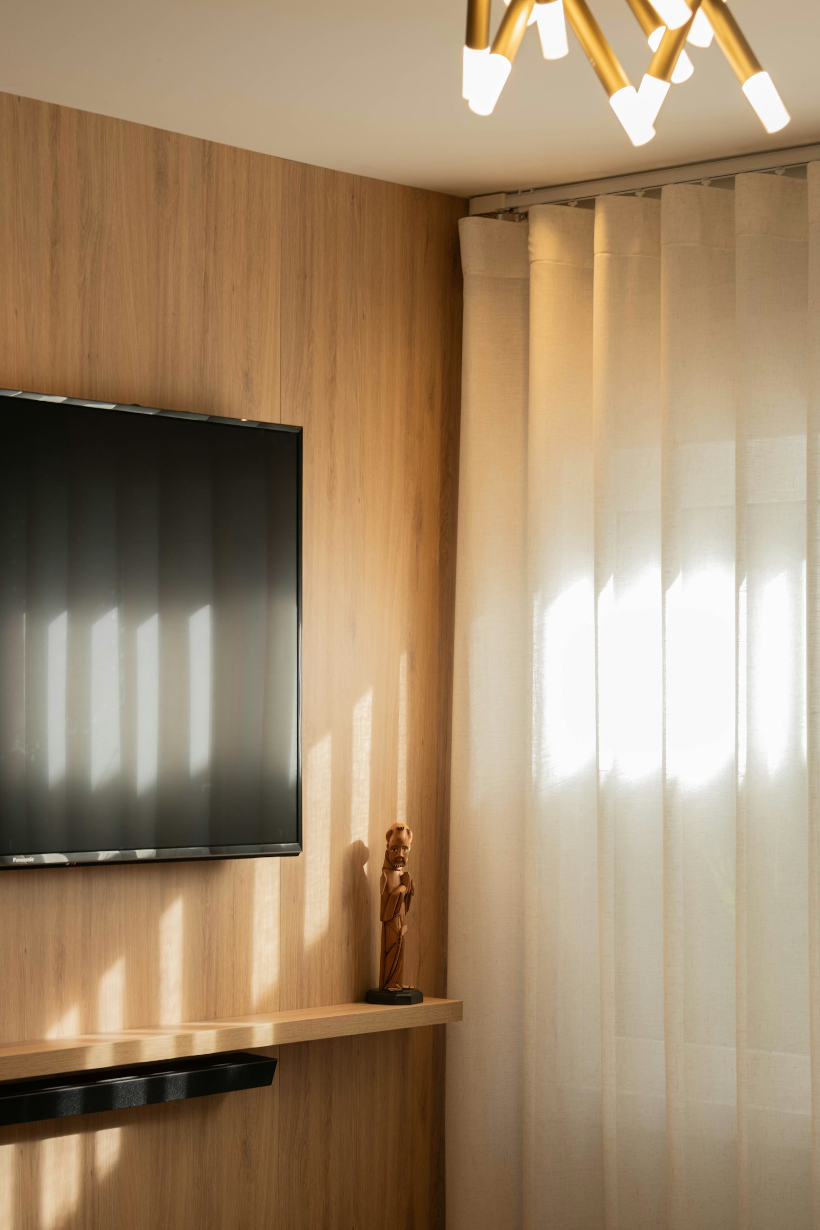 Living room photographed under warm interior lighting.